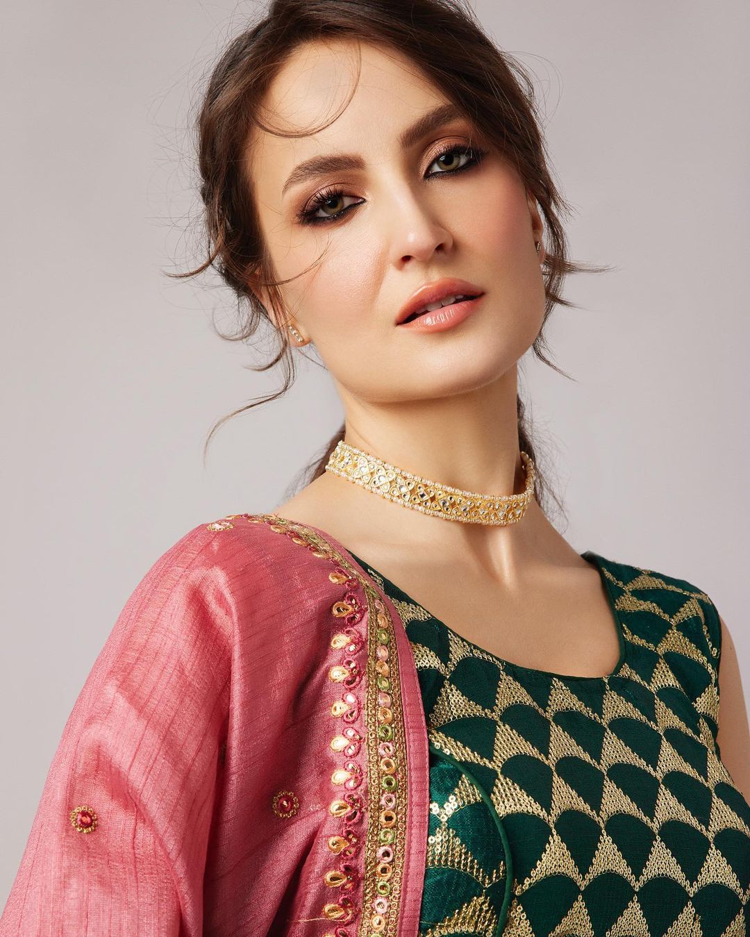 Indian Actress Elli AvrRam Pics in Green Lehenga Choli